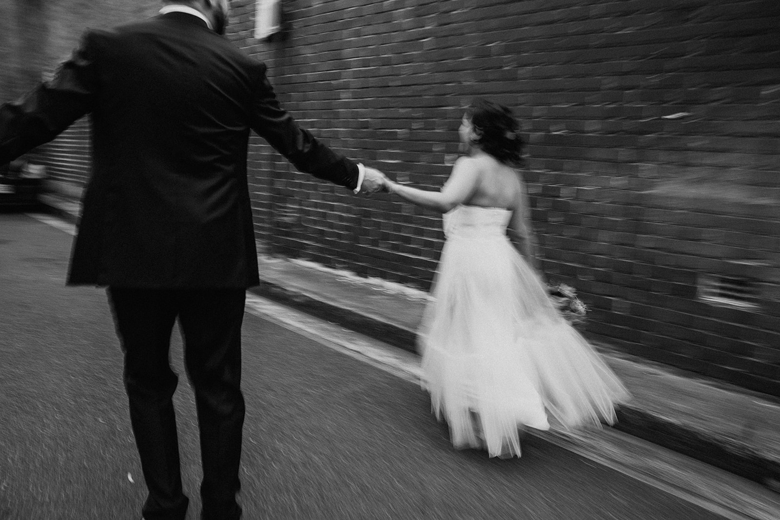 The bride and groom in a motion blur portrait