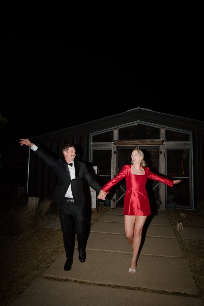 Alandra and Scott partry night night away at Tinkersfield with Alandra wearing a red mini